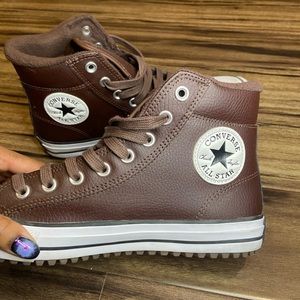 Brown leather Converse shoes